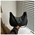Small dumpling-shaped PU leather women's shoulder bag in khaki with a single strap and zip closure.