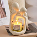 Modern loving couple resin statue in milky white or gold, a decorative figurine for desks and shelves.