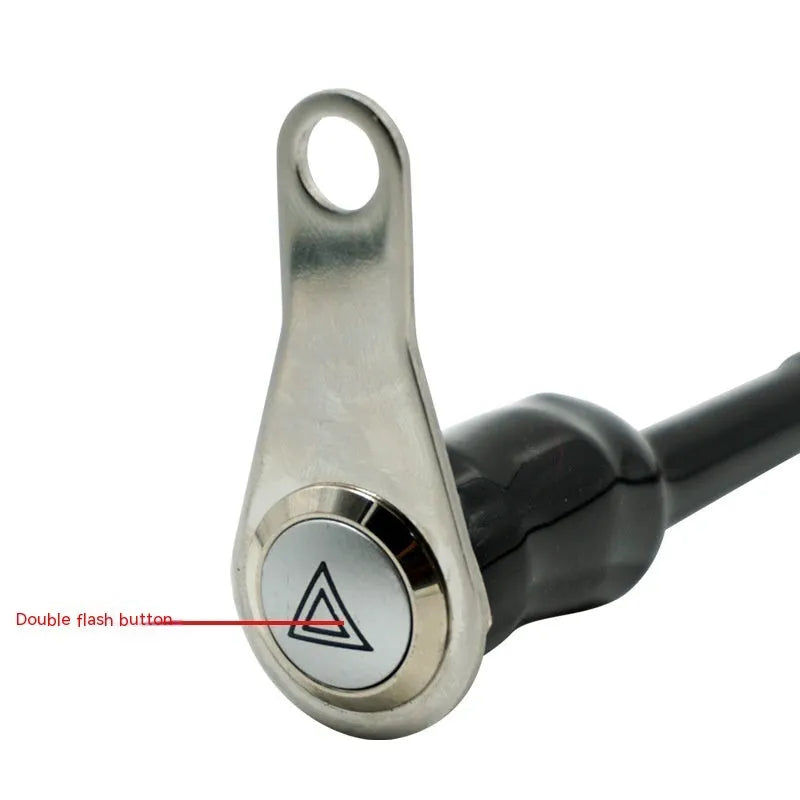 Black stainless steel motorcycle switch with a metal button and light ring for double flash control.