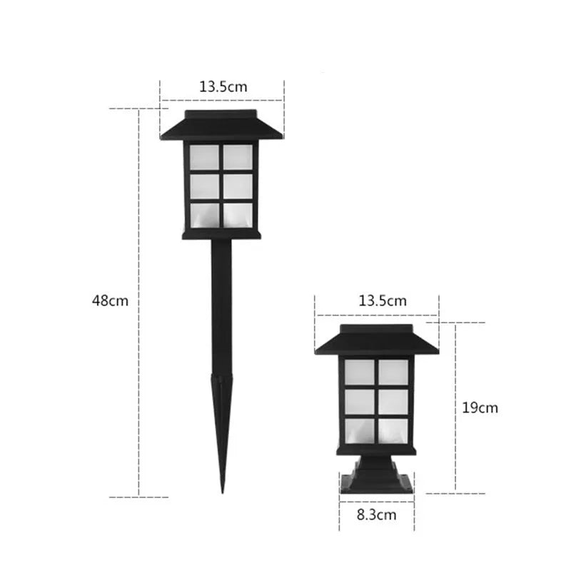 Black solar-powered LED lawn light for outdoor garden and pathway illumination with waterproof construction