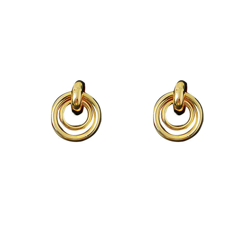 Geometric round ring earrings for women with electroplated gold or silver finishes and irregular contemporary design