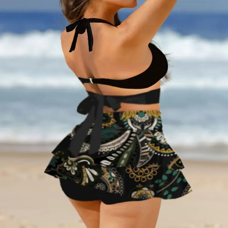 Purple high-waist bikini with matching skirt and lace-up back detail
