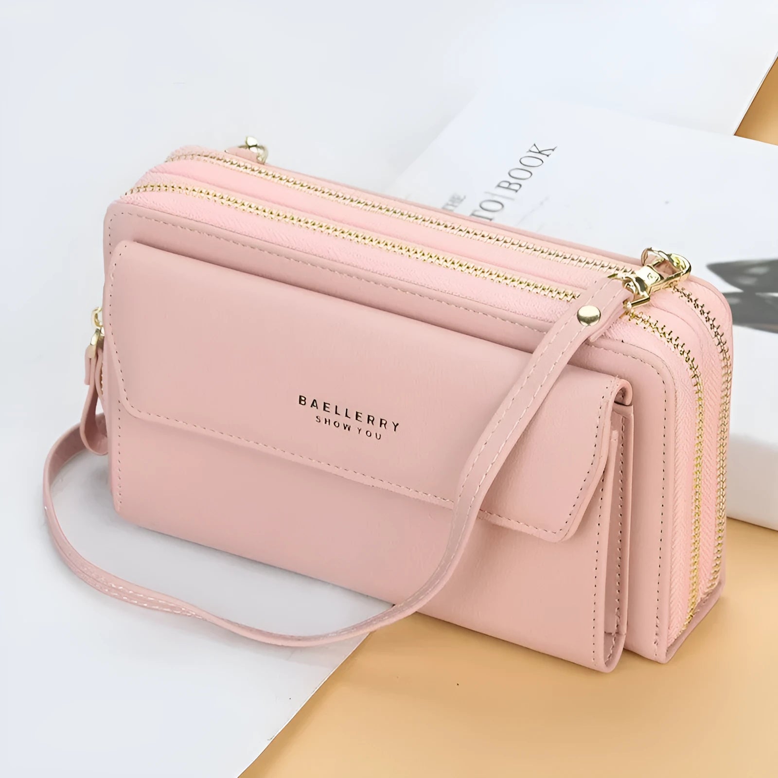 Soft PU leather ladies long wallet messenger bag with a double zipper, shown in a choice of colours.
