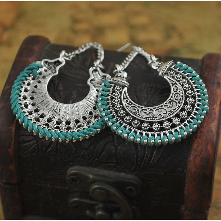 Bohemian vintage alloy and rope U-shaped drop earrings with hollow carved meniscus flower basket design, 5.8cm length, 3.8cm width