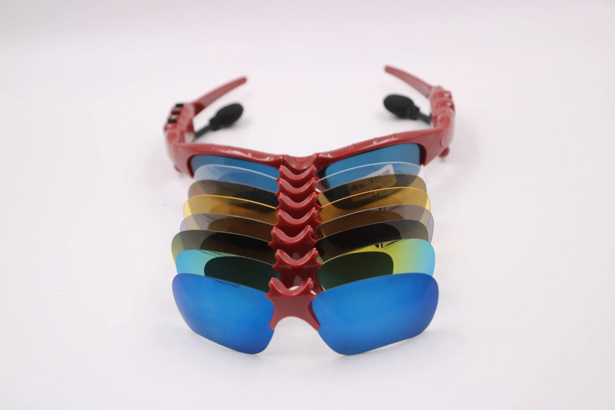 Bluetooth smart sunglasses black frame with polarised lenses opened on a surface