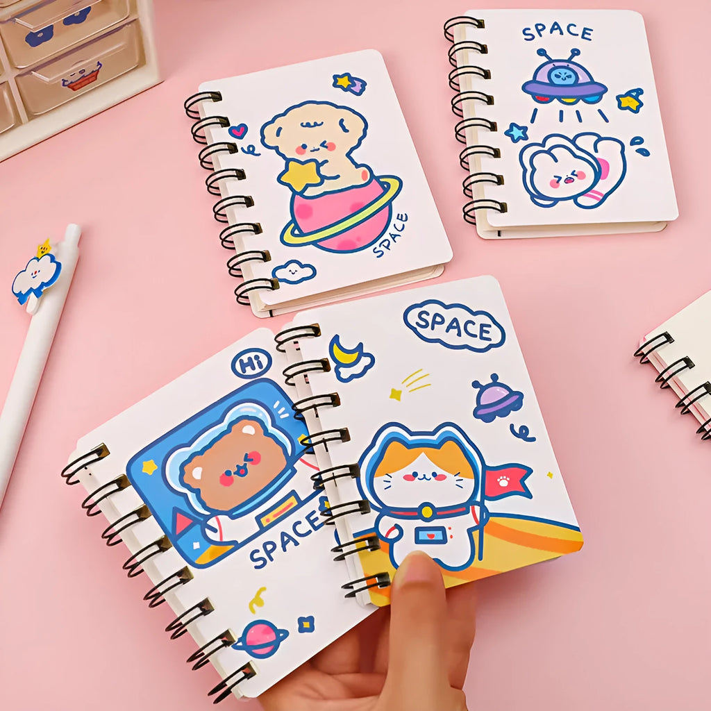 Astronaut series pocket notebook in 10.5cm by 8cm size, showing cover options: Astronaut Bear, Planet Teddy, Space Cat, UFO.