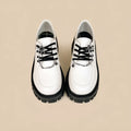 Women's Duke Asterism coloured loafers with a metal cross-strap and round toe in a preppy style.