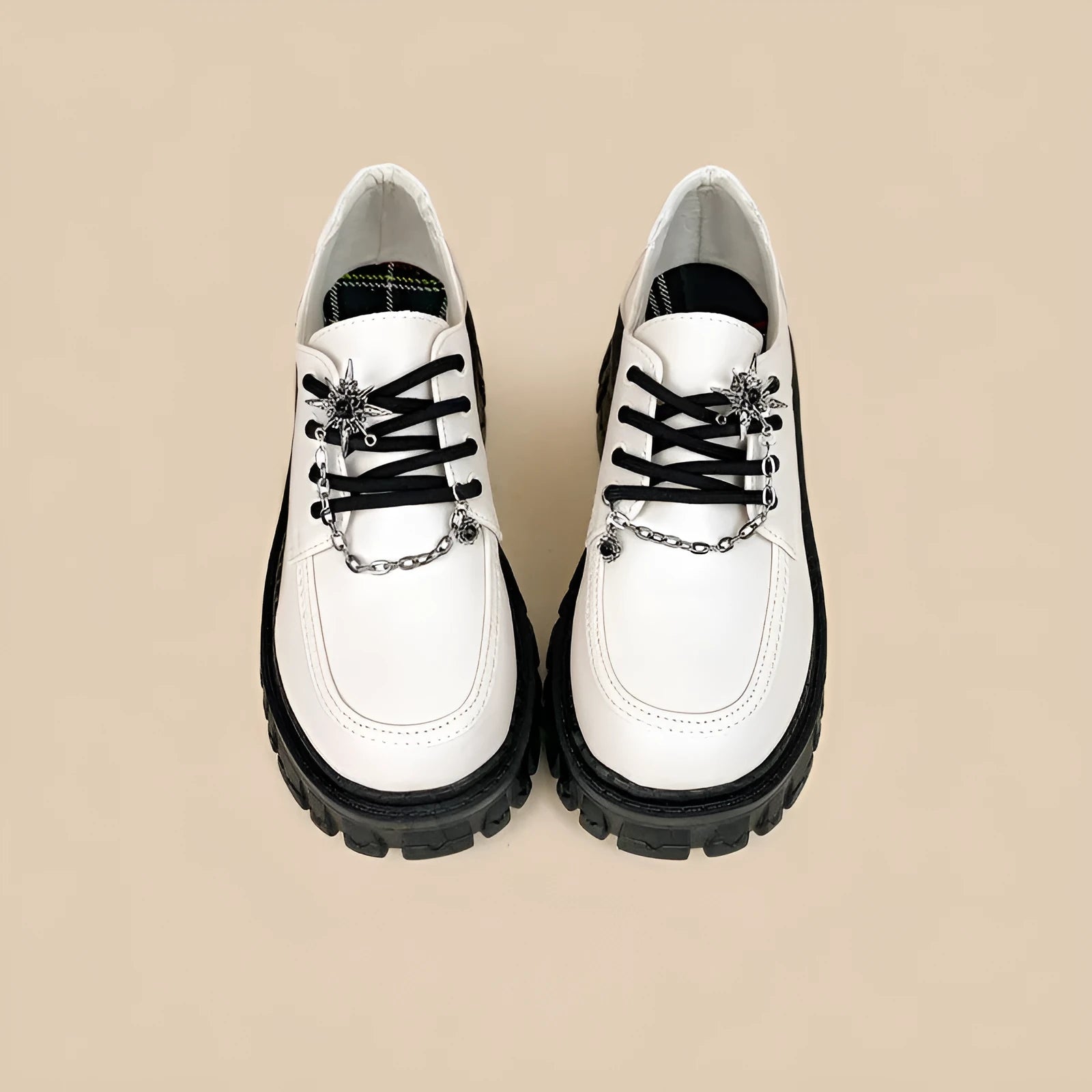 Women's Duke Asterism coloured loafers with a metal cross-strap and round toe in a preppy style.