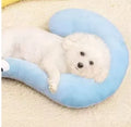 Blue and yellow U-shaped cat neck protection pillows in moon and question mark styles on a white background.