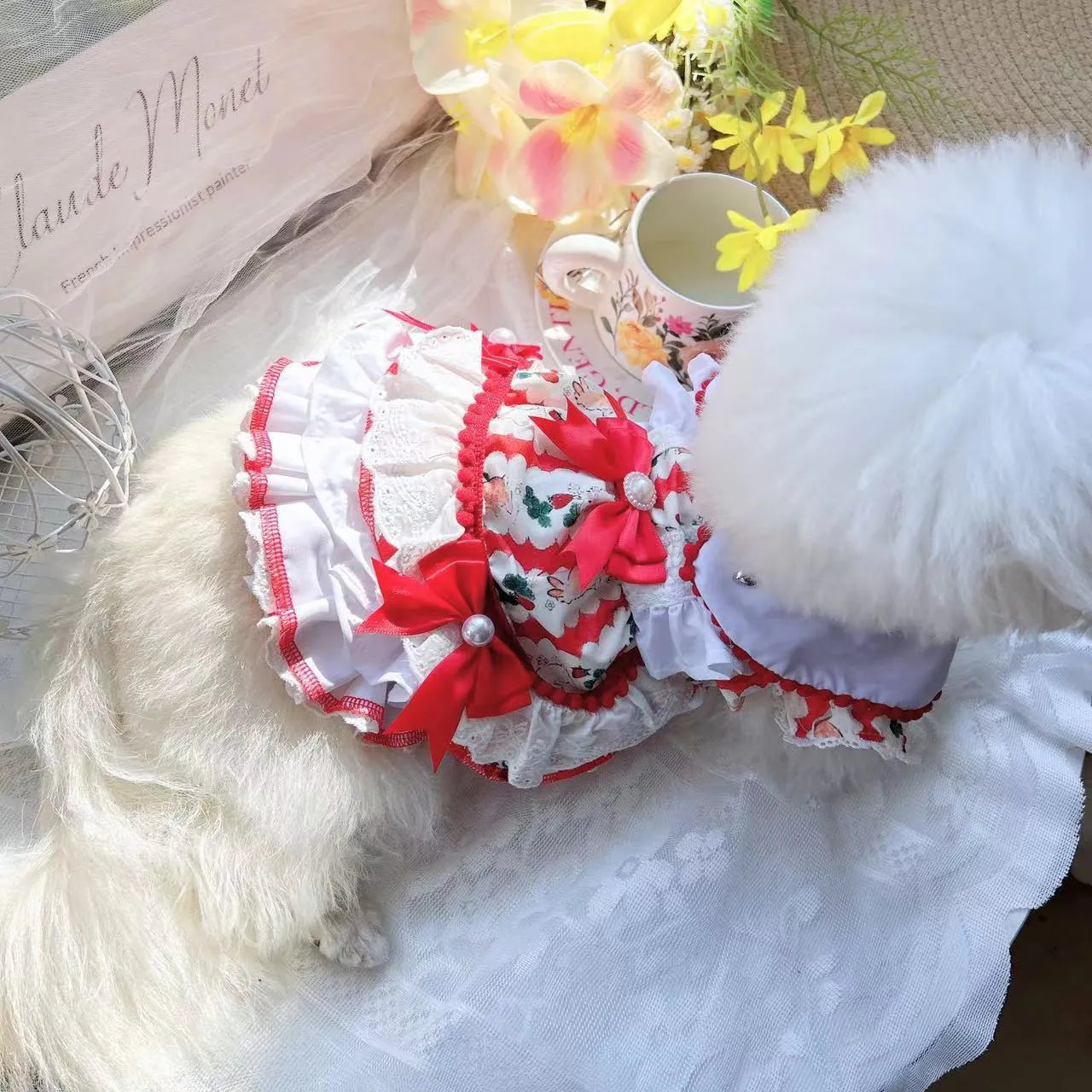 Small white dog wearing a light pink rabbit skirt princess-style polyester dress.