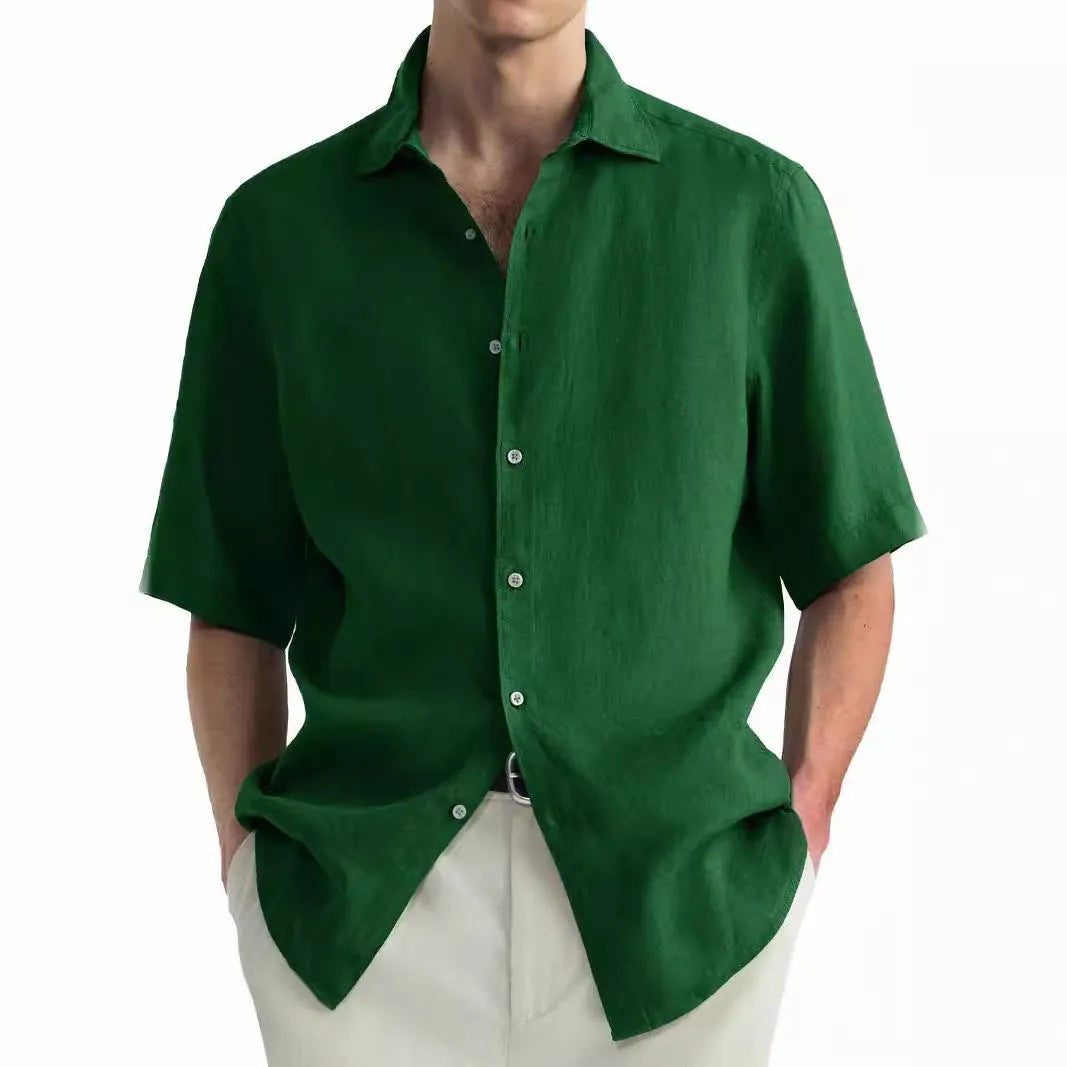 Men's green casual cotton cardigan shirt with matching trousers laid flat