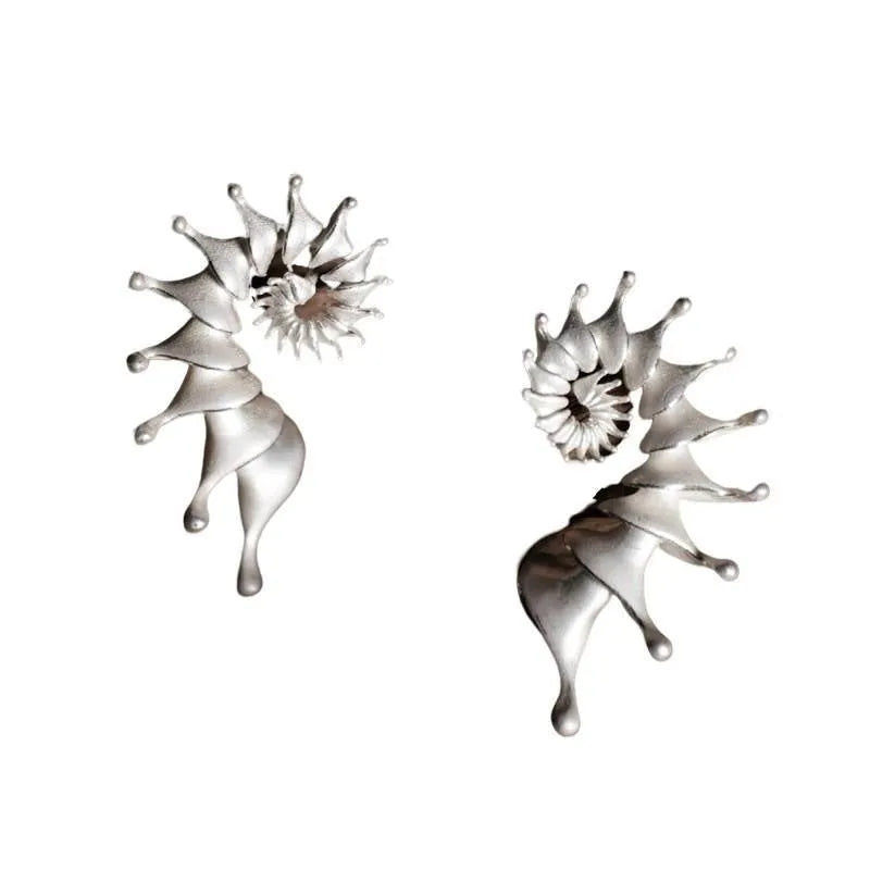 Exaggerated three-dimensional conch stud earrings with matte electroplated alloy finish
