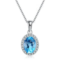 925 sterling silver four-piece jewellery set with blue topaz gems showing geometric earrings, ring, necklace, and pendant