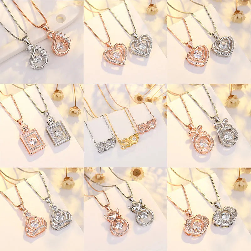 Women's sterling silver love heart necklace with crown and bow details on pendant