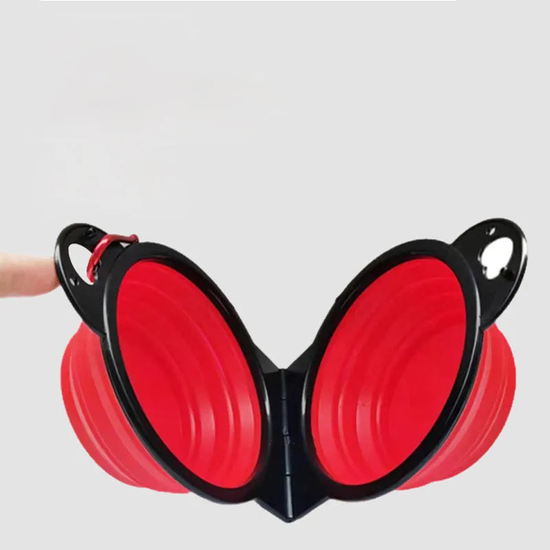 Blue silicone folding pet bowl showing two compartments for food and water in unfolded position