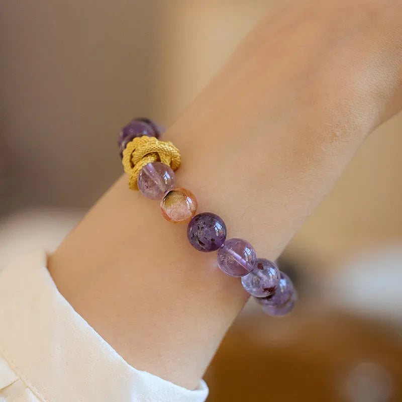 Purple cornucopia crystal bracelet with animal zodiac modelling in retro style