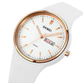 Women's silicone strap quartz watch with white dial on a light blue strap, showing calendar window.