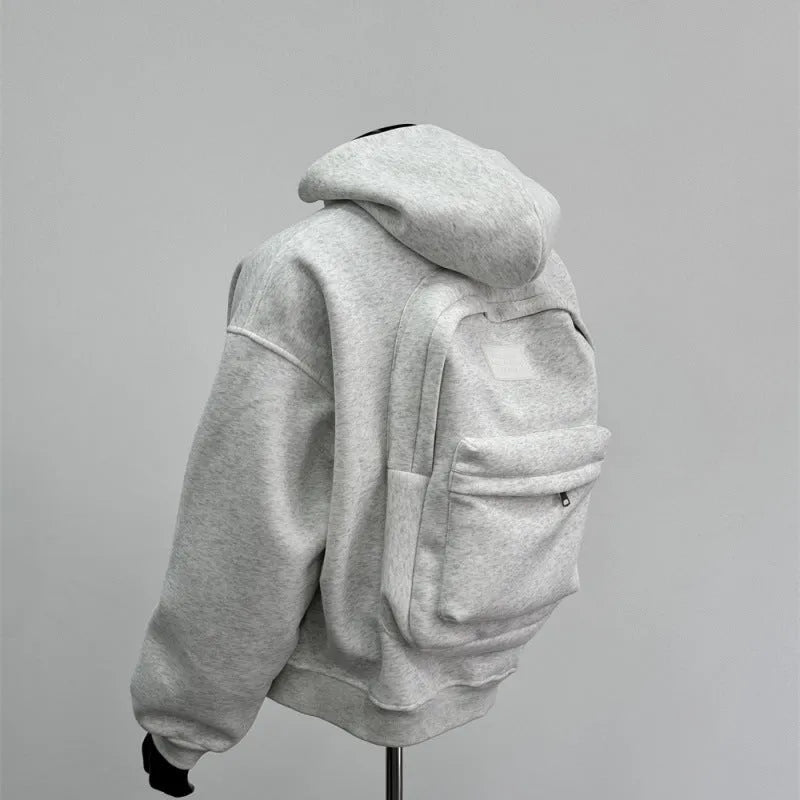 Men's grey hoodie jacket with back schoolbag design detail showing front and back views