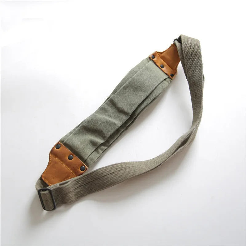 Green military style chest bag made from washed canvas with Italian cowhide leather trim