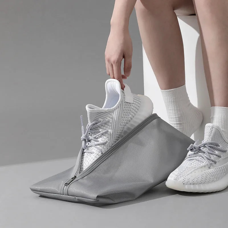 Travel shoes buggy dustproof storage bag in beige, made from TPU protective film, large size 40x22cm.