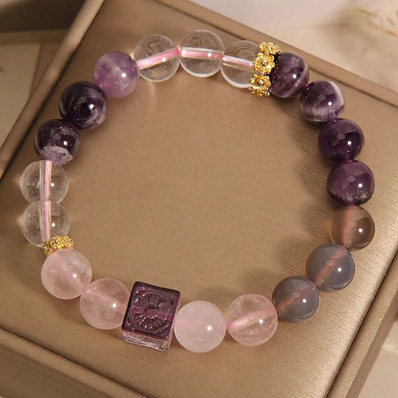 Close-up of a women's purple crystal amethyst bracelet with rhinestones, showing its 10mm size.
