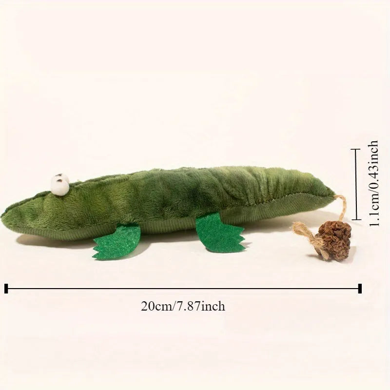 Green plush alligator cat toy with plant based catnip and peppermint scent for oral cleansing