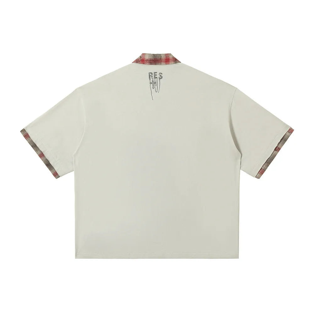 Men's loose asymmetric short-sleeved top with graffiti print on lapels in residual blue colour