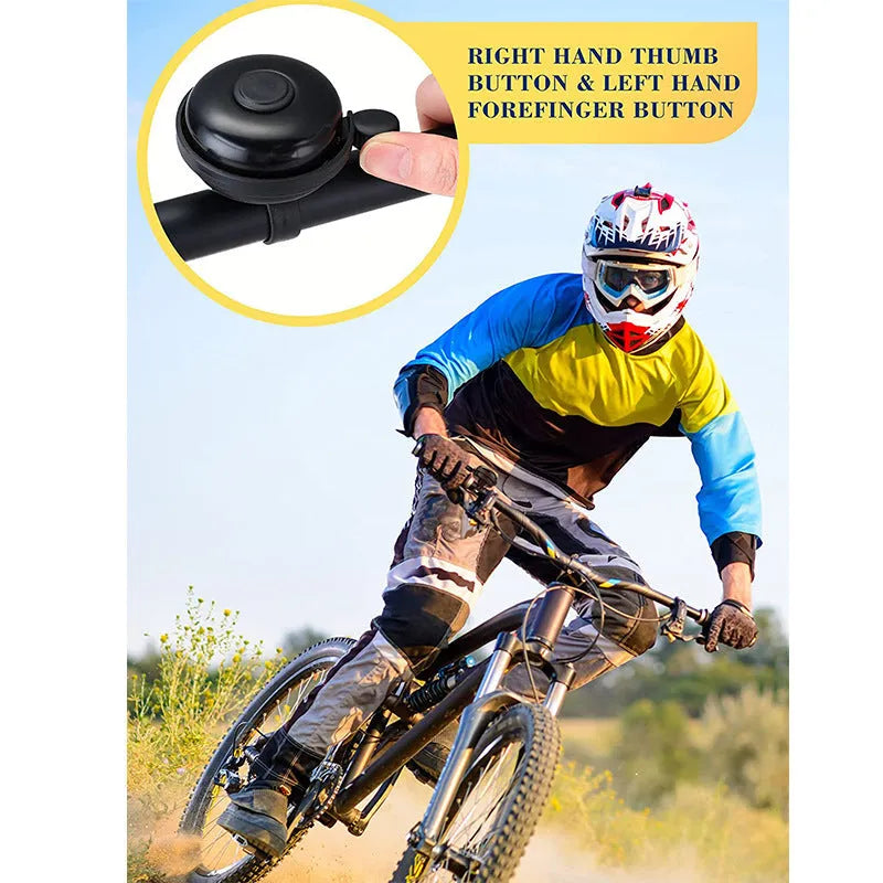 Black ABS plastic bicycle bell with 58mm diameter on a bicycle handlebar
