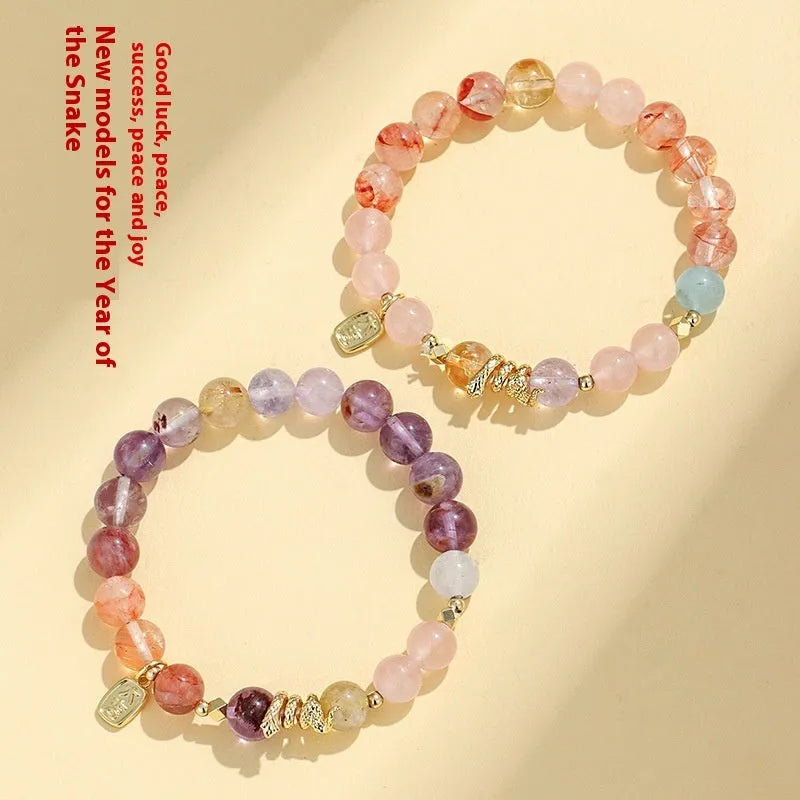 Women's lucky snake crystal bracelet with plastic flower charms and traditional Fu snake design in manual processing