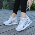 Mesh height increasing casual sneaker in dark blue with front lace-up and low-top design