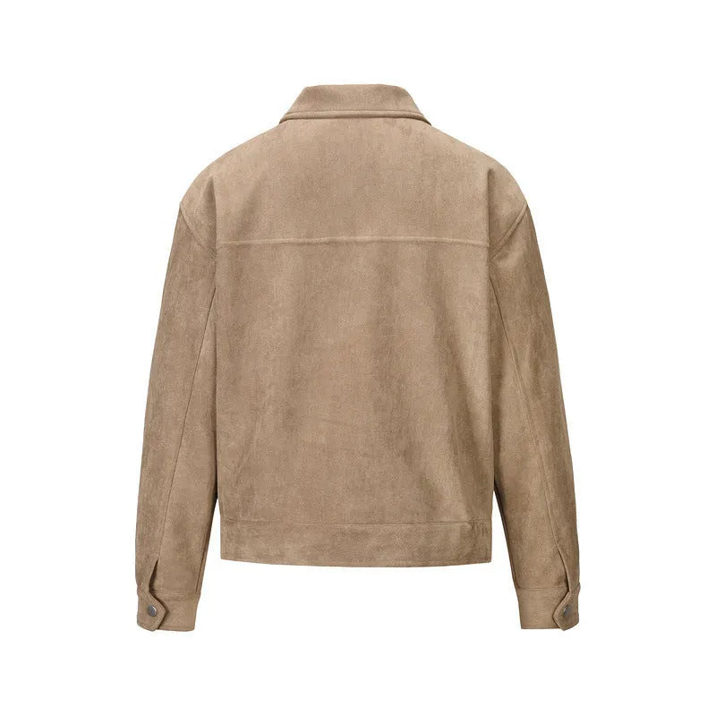 Slim fit camel coloured jacket with zipper pockets on a model.