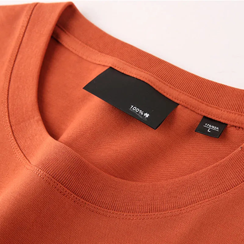 Cotton round neck T-shirt with drop-shoulder sleeves in solid colour options