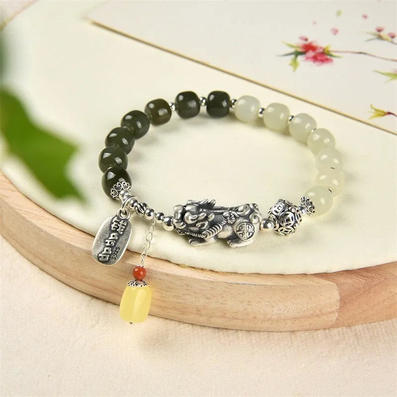 Retro women's bracelet with pure silver coin charm and natural Hetian jade bead