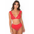 Women's black and white polka dot print bikini set with deep V-neck and ruffled detailing