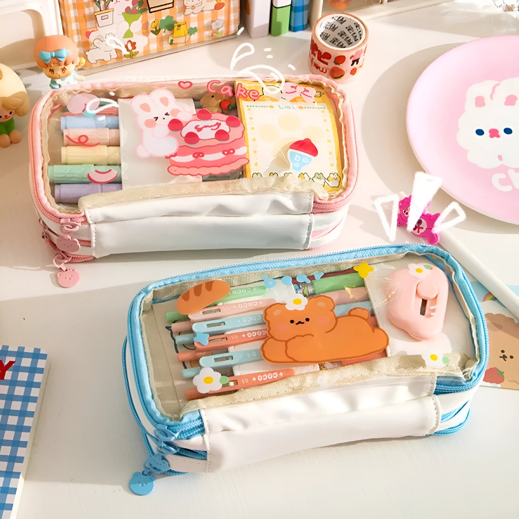 Transparent heart-shaped pencil case with Korean style design in pink rabbit theme showing pens inside