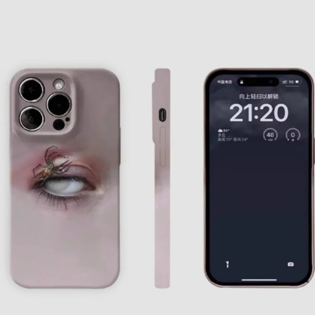 Dark heterochromatic spider design resin phone case for iPhone, showing frosted finish and soft shell construction.