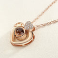 I love you 100 languages projection necklace, copper with gold plating, 50cm chain, pendant detail