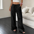 Women's black wide-leg trousers with a lace-up detail on the mid-rise waistband.
