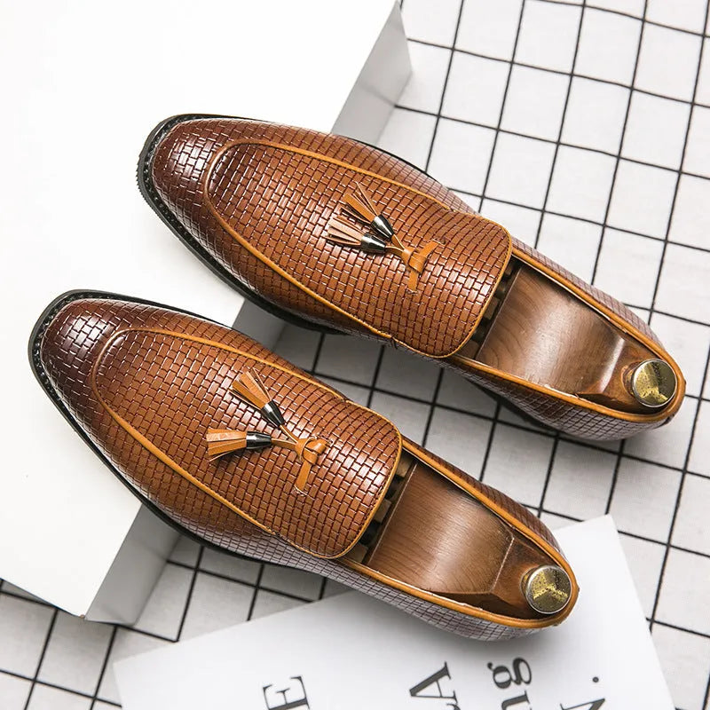Men's black pointed toe slip-on shoes with tassel detail for business wear