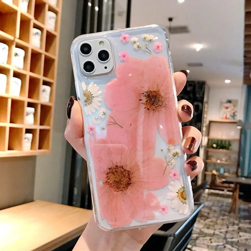 Floral TPU phone case for iPhone with large pink flower design on back.