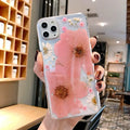 Floral TPU phone case for iPhone with large pink flower design on back.