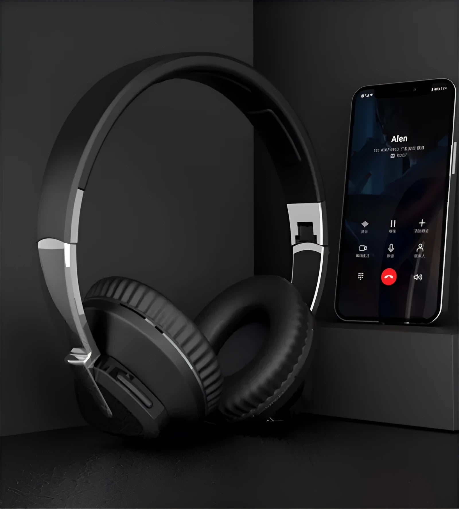 Black wireless over-ear headset with AUX cable and TF card slot, showing soft ear cups and control buttons.