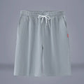 Cotton and linen cropped casual trousers in a solid colour with a drawstring waist.