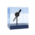 Holographic 3D fan screen displaying a floating holographic image on a desk with a remote control nearby