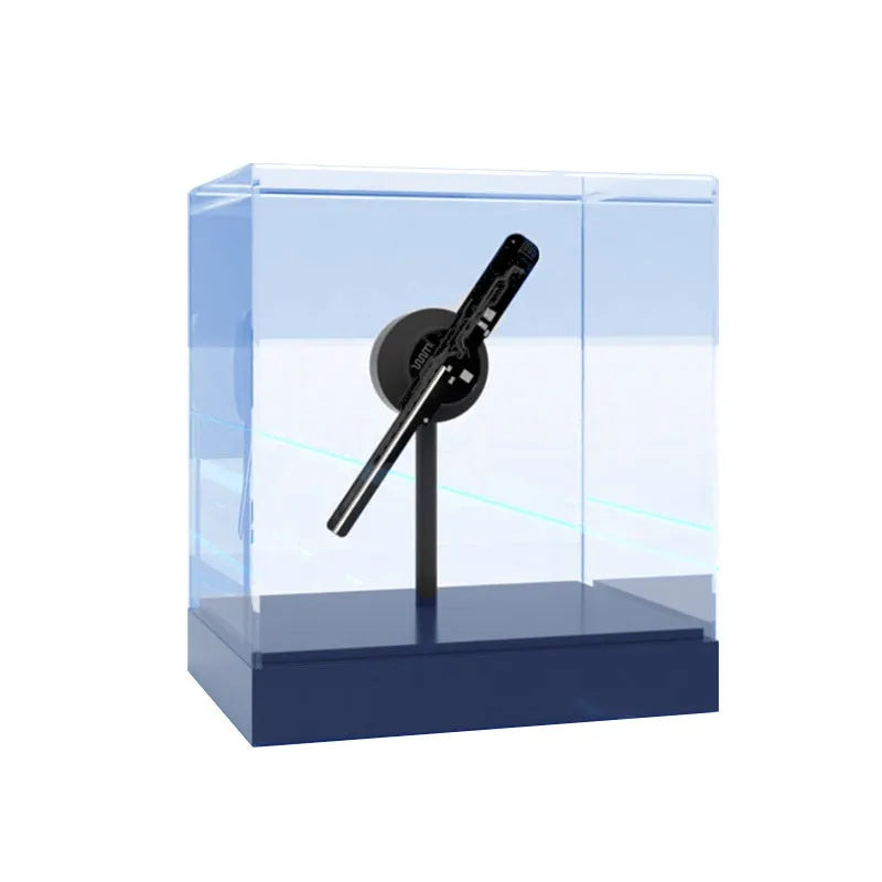 Holographic 3D fan screen displaying a floating holographic image on a desk with a remote control nearby