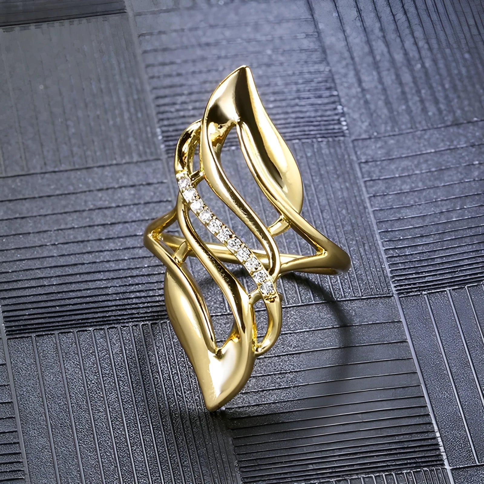 Women's copper ring with exaggerated curved design and zircon stone accents in gold colour