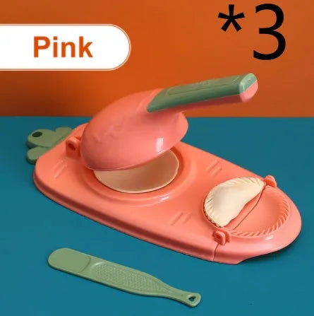 Orange and white plastic dumpling maker tool with ergonomic handle and hanging hole