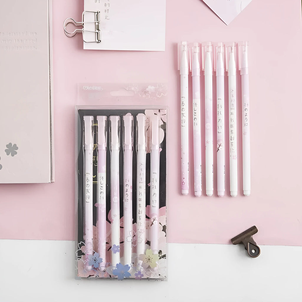 Sakura gel pen set with six black ink pens showing pull-out mechanism and 0.5mm needle tube refills