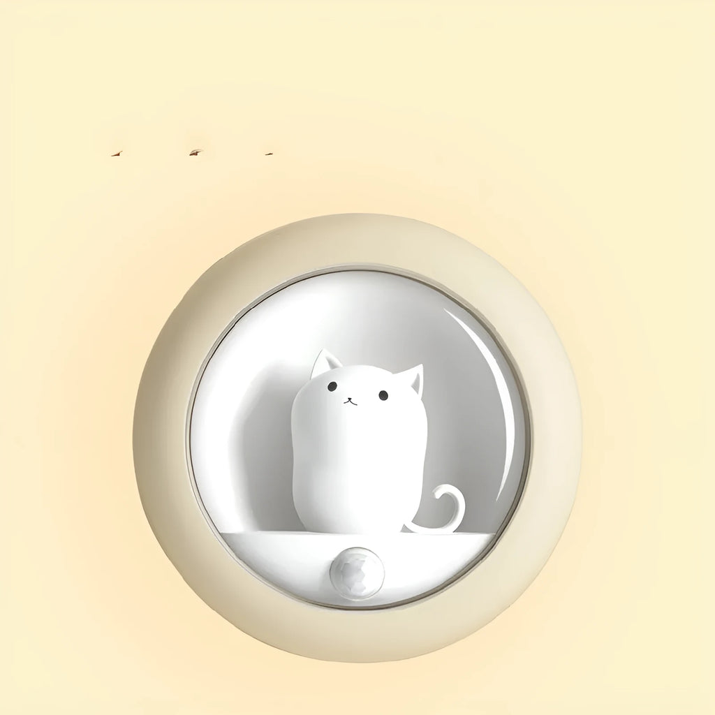 Colour-changing sleep night light with projection feature on a bedside table.