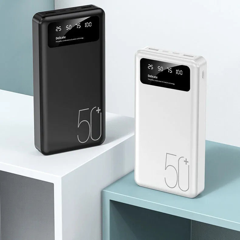 50000 mAh portable power bank with LED display and fabric texture finish in black or white